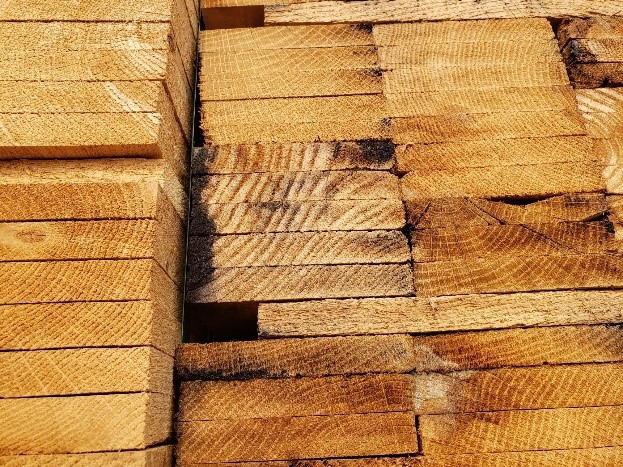Brown stain discoloration on recycled wood pallet surface